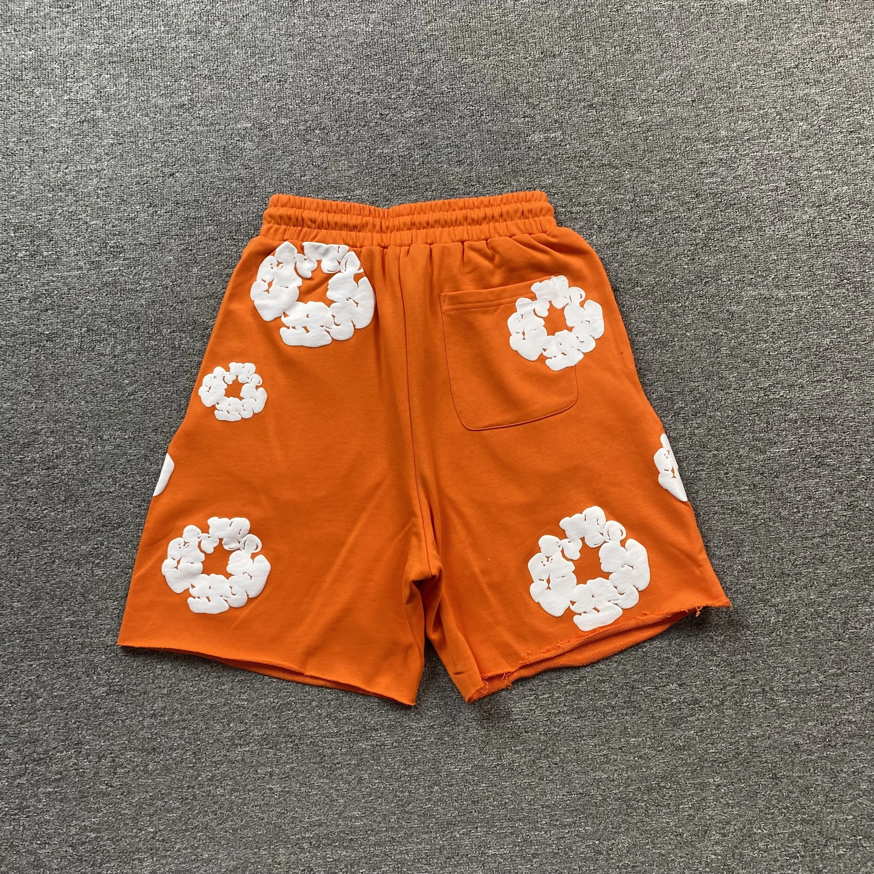 DENIM TEARS COTTON WREATH SHORTS ORANGE