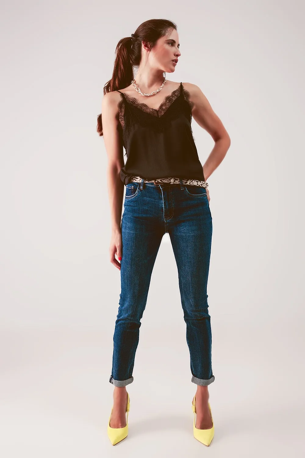 High rise skinny jeans in midwash blue