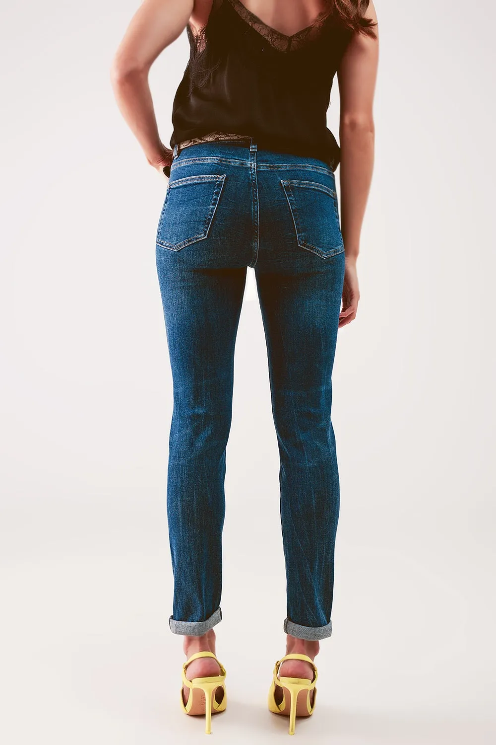 High rise skinny jeans in midwash blue