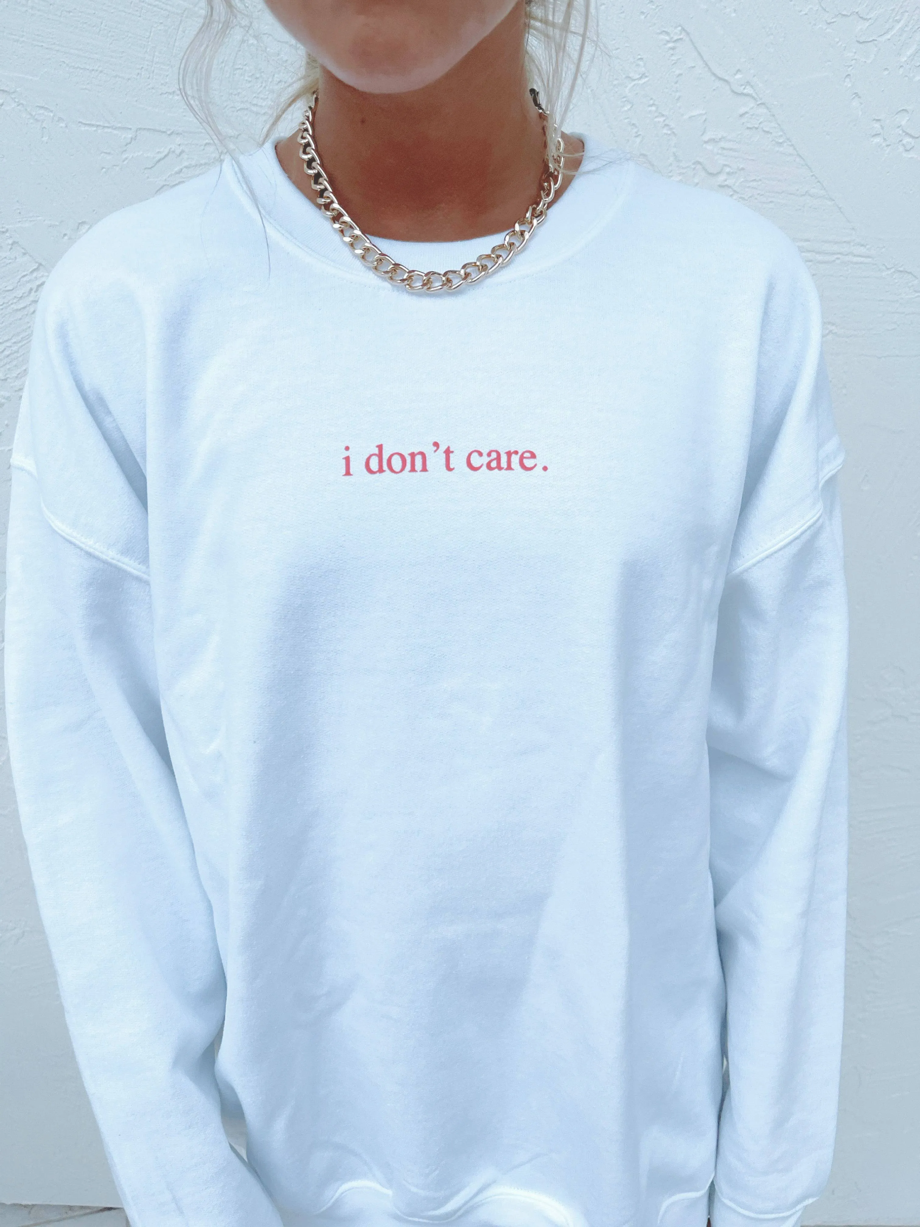 I DON’T CARE CREWNECK