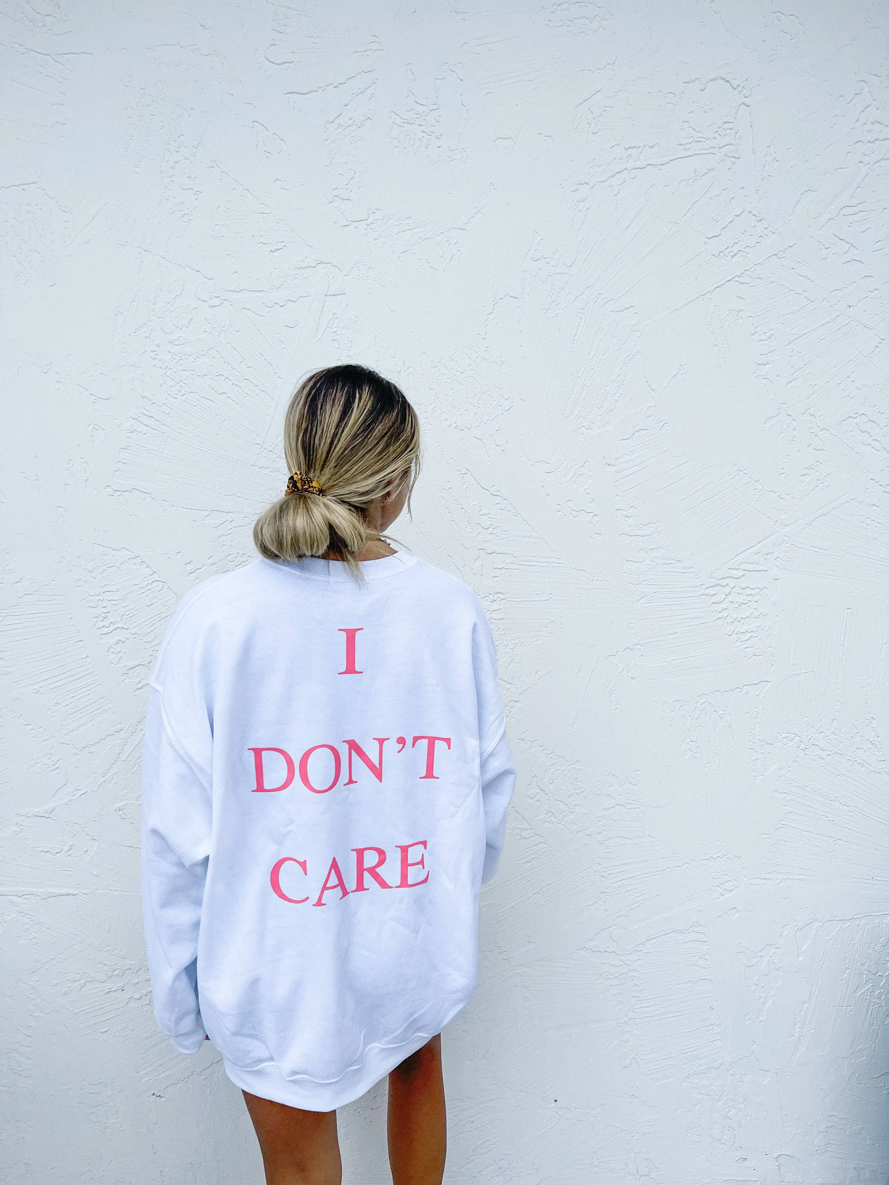 I DON’T CARE CREWNECK